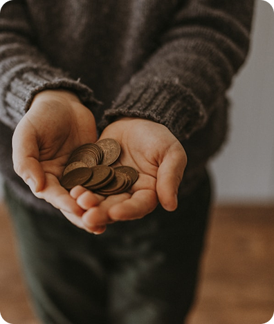 Hands holding coins