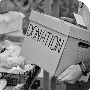 Hands holding donation sign